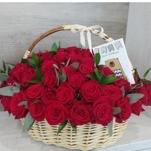Flower basket '51 red roses in a wicker basket'