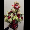 Caja redonda 18 rosas con osito