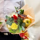 Bouquet of flowers and fruits
