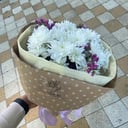 Delicate bouquet with chrysanthemum and statice