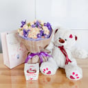 Attraction with candies and a teddy bear