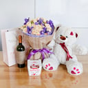 Attraction with candies, teddy bear and wine
