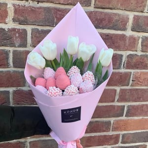 Bouquet of strawberries and tulips