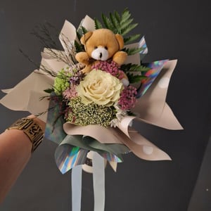 Teddy bear with rose