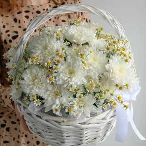 Bouquet 'A light, airy arrangement of daisies and chrysanthemums.'