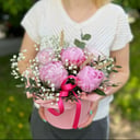 Tender Sarah Bernhardt peonies in a box