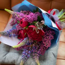 Bouquet with peonies and lilacs