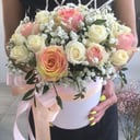 Assembled composition in a hat box