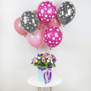 "Motif floral" avec des ballons à l'hélium
