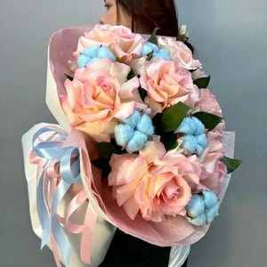 Bouquet featuring a French rose and cotton