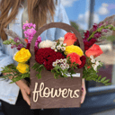 Arrangement of matthiol, roses and chamelacium