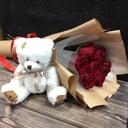 Red roses with a bear