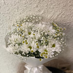 Assembled bouquet of chrysanthemum and chamomile