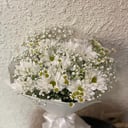 Assembled bouquet of chrysanthemum and chamomile