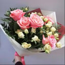 Bouquet of roses and pistachio