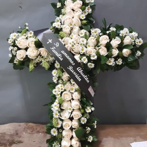 Cross of white roses