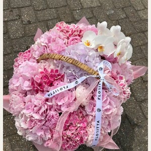 Pink hydrangea basket with orchids and roses