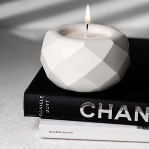 Scented candle in gypsum planter