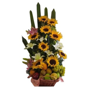 Obstschale mit Sonnenblumen und Lilie