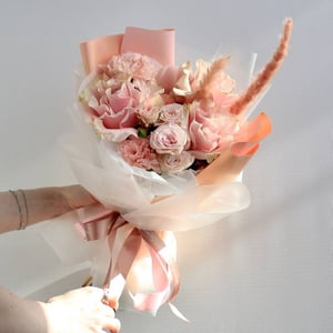Signature bouquet of delicate roses