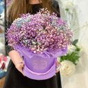 Gypsophila multicolored in a hatbox
