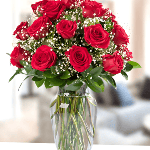 Arrangement 'Vase with 24 red roses with gypsophila'