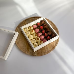 Bananen und Erdbeeren in Schokolade "Лорьян" L