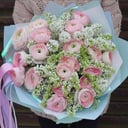Bouquet of ranunculus and white lilac