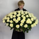 101 white roses in a basket