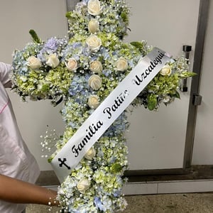 Cross of 24 roses and hydrangeas