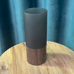 Blue vase with a brown stripe