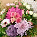 Round bouquet of pink and parma color