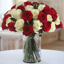 A bouquet of 25 red and white roses