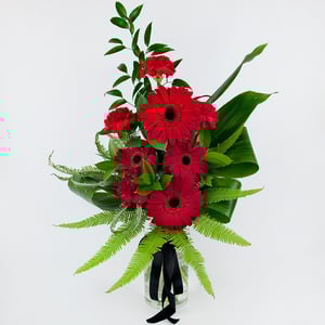 Mourning bouquet: red gerberas