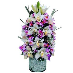 Round arrangement of orchids