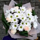 Delicate bouquet of roses and chrysanthemums