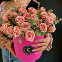Pink roses in a hat box