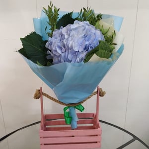 Bouquet of hydrangea with greens