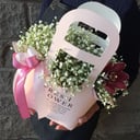 Composition with gypsophila and orchid