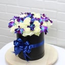 Ramo de orquídeas en caja