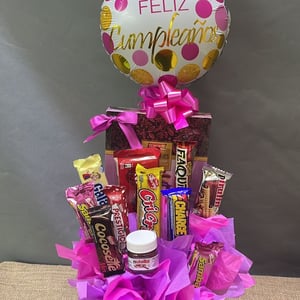 Box of mixed candies and a small balloon