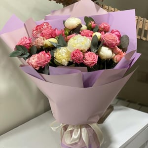 Assembled bouquet with fragrant peonies