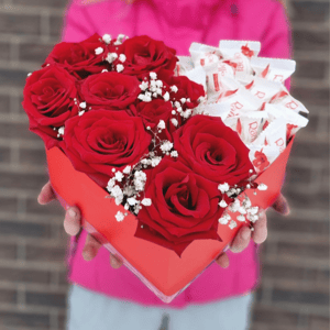 Composition of Roses and Raffaello Candies