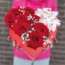 Composition of Roses and Raffaello Candies