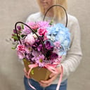 Assorted fresh flowers in a bag