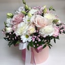 Delicate composition in a hat box