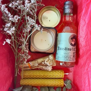 A symphony of wine, flickering candles, and sacred Palo Santo