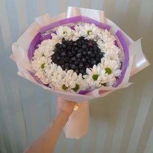 Bouquet of blueberries and chrysanthemums