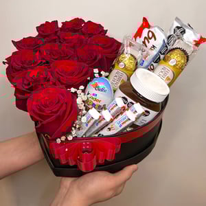 A box of roses and sweets — a romantic treat for a special occasion