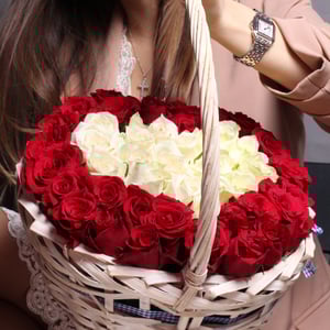 51 heart-shaped roses in a basket